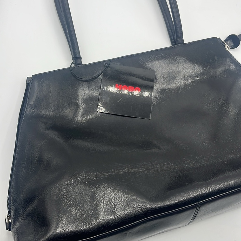 HOBO Glossy Black Leather Handbag. NWT
